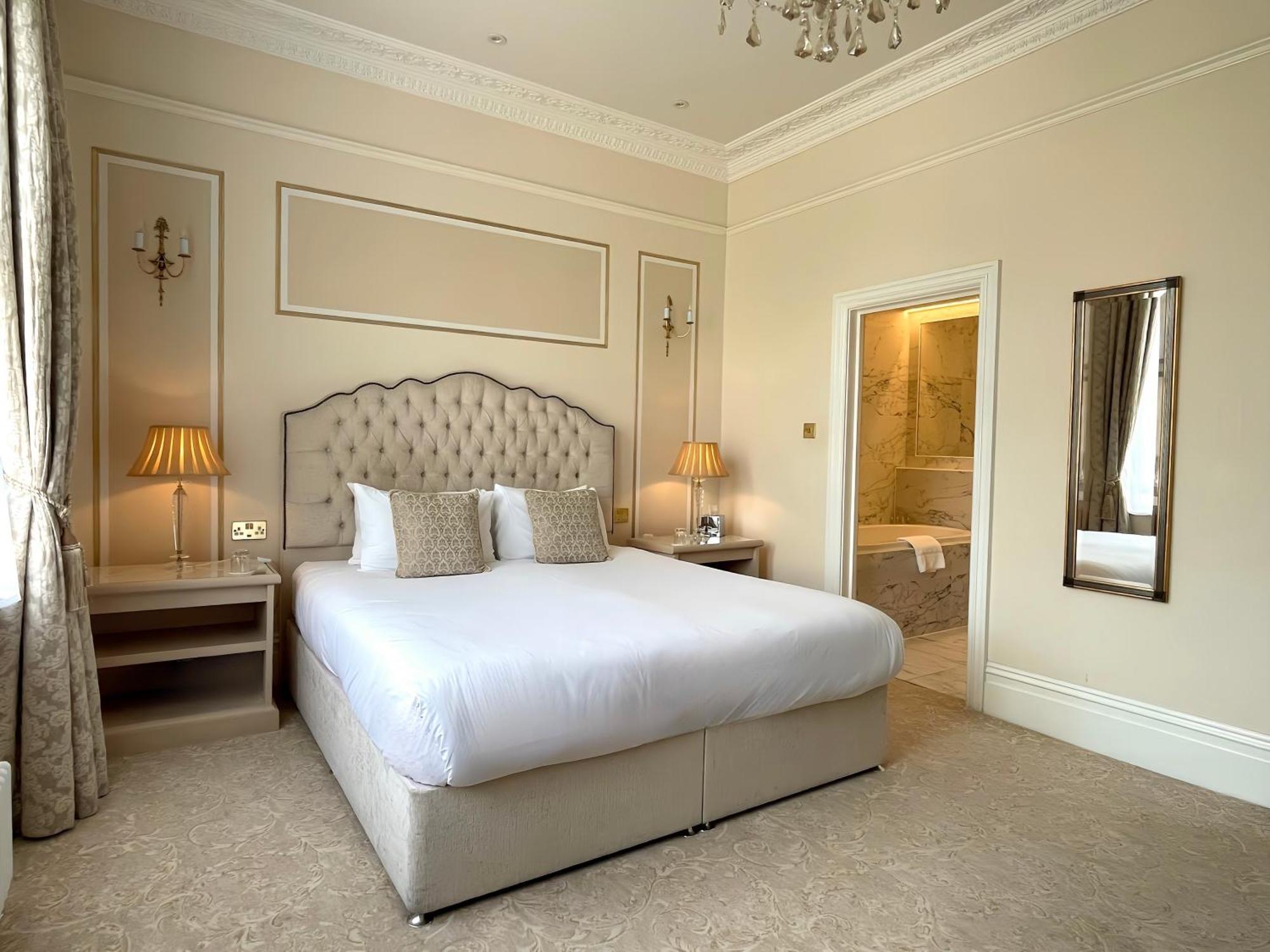 Bathen House Boutique Hotel Camera foto A bedroom at the hotel